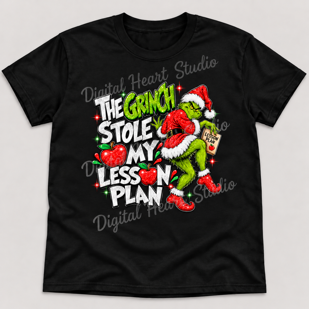 The Grinch Stole My Lesson Plan Black Gildan T-Shirt smaller centered print with faded watermark